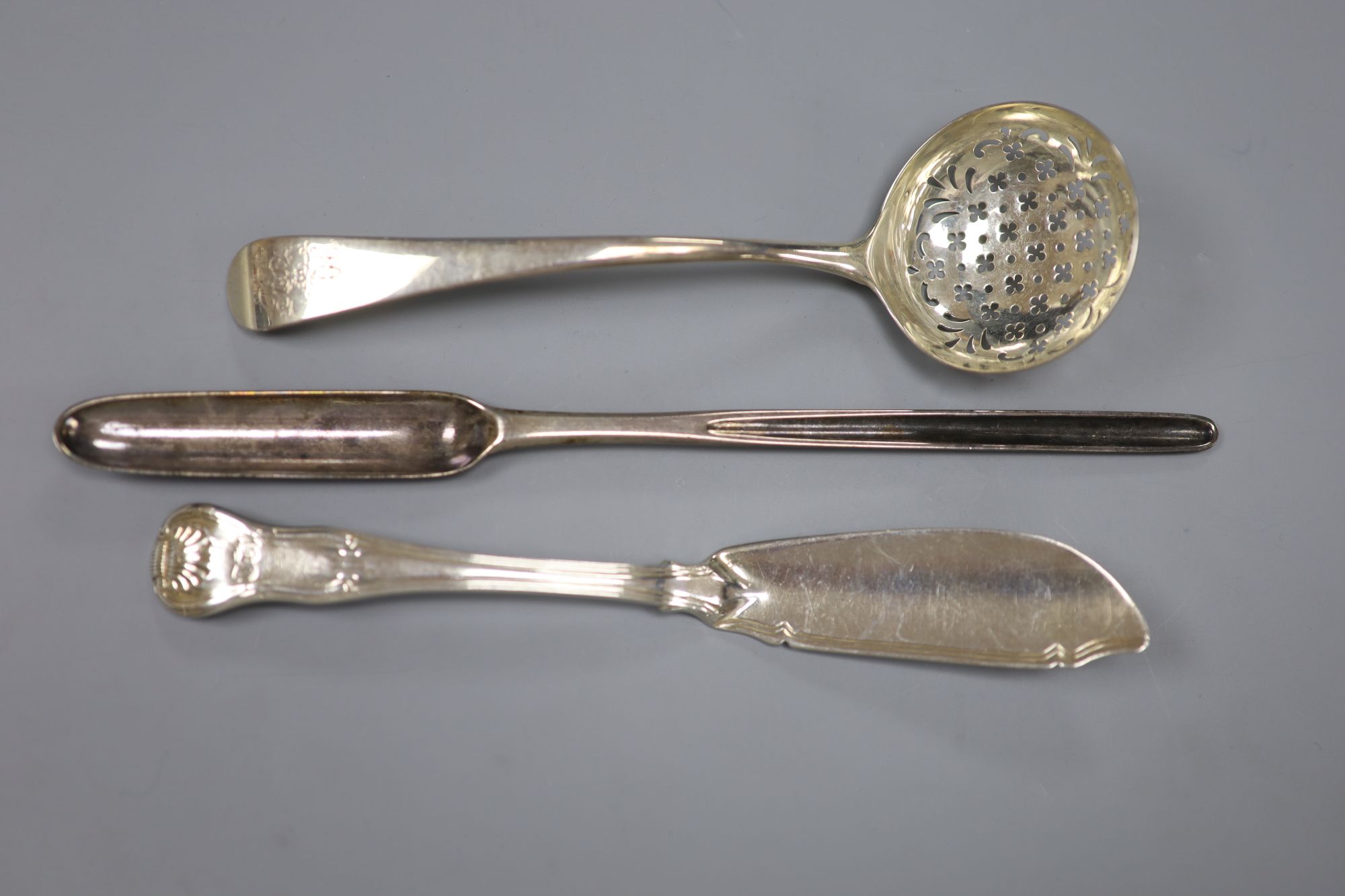 A George III silver marrow scoop, London, 1808, a silver butter knife and a George III silver sifter spoon, London, 1776, 4.5oz.